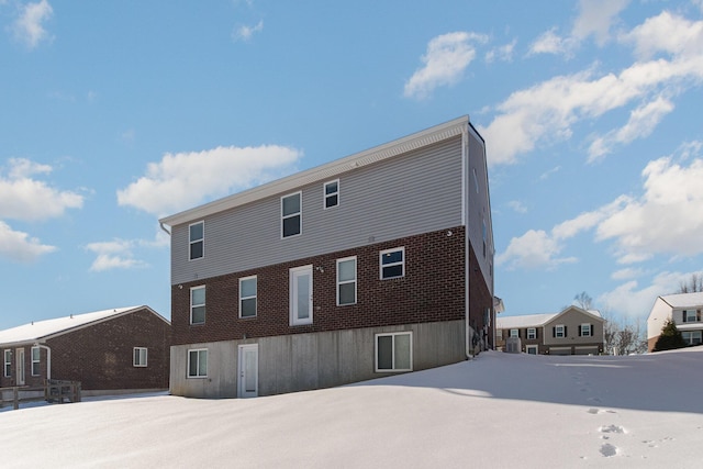 view of snow covered property