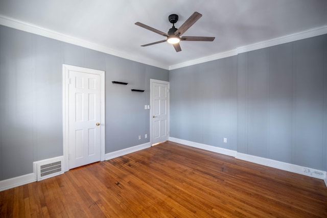 unfurnished room featuring crown molding, ceiling fan, and hardwood / wood-style flooring