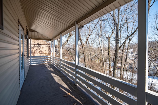 view of snow covered deck