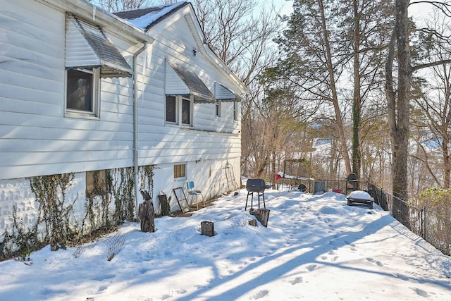 view of snow covered property