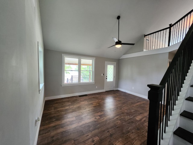 entrance foyer featuring ceiling fan, dark hardwood / wood-style floors, and high vaulted ceiling