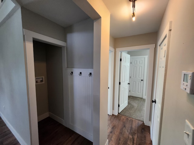 hallway featuring dark hardwood / wood-style flooring