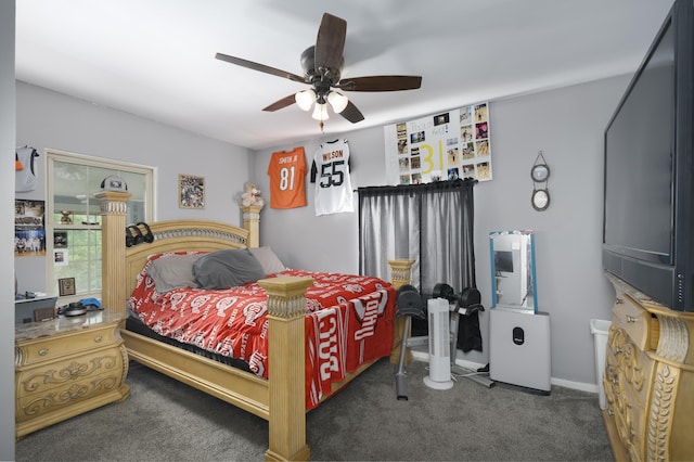 bedroom with ceiling fan and dark colored carpet