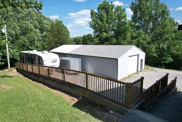 exterior space with a lawn and a garage