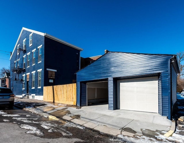 view of front of house featuring an outbuilding and a garage