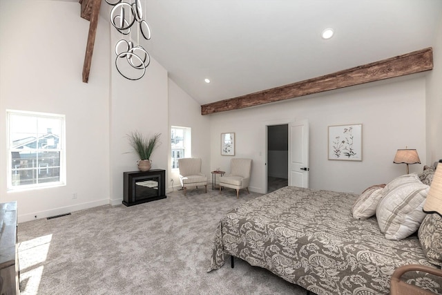 carpeted bedroom with high vaulted ceiling and beamed ceiling