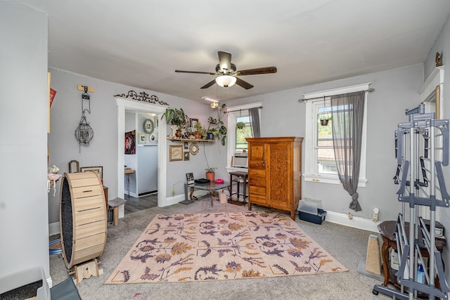 carpeted bedroom with ceiling fan