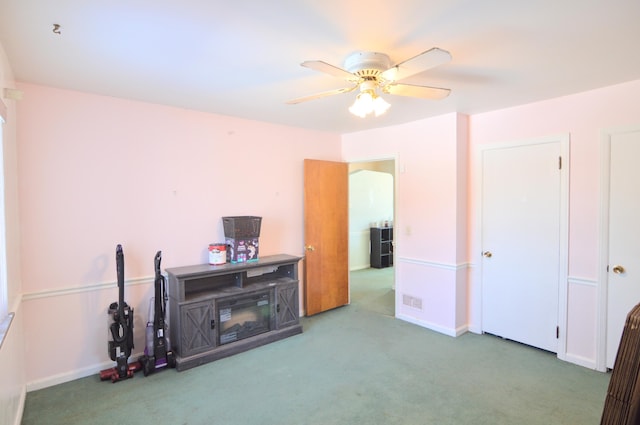 332 Swan Cir, Elsmere, KY 41018 - carpeted living area featuring ceiling fan and baseboards