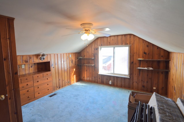 332 Swan Cir, Elsmere, KY 41018 - additional living space with vaulted ceiling, wood walls, ceiling fan, and carpet