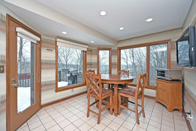 dining room featuring light tile patterned flooring