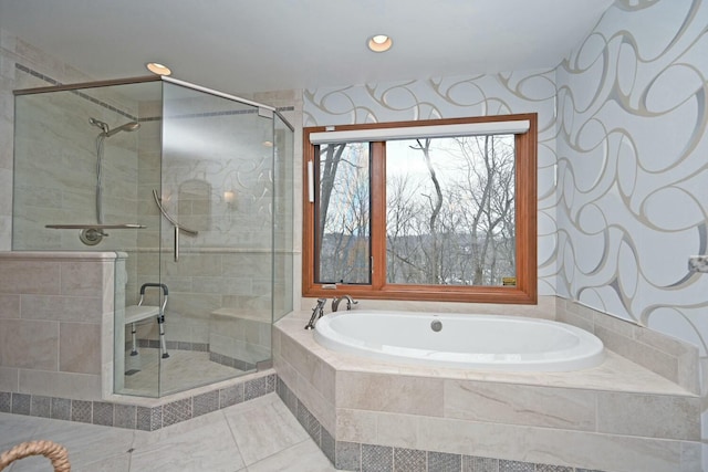 bathroom featuring tile patterned floors and independent shower and bath