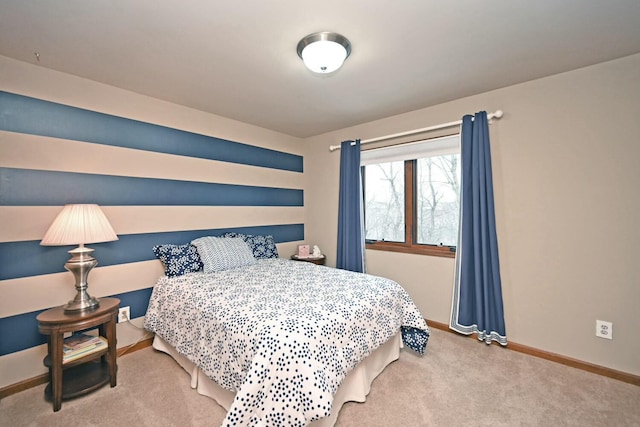 bedroom with light colored carpet