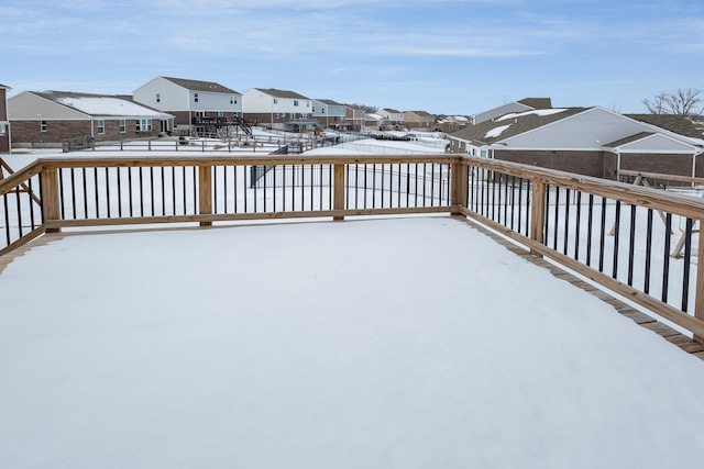 view of snow covered deck