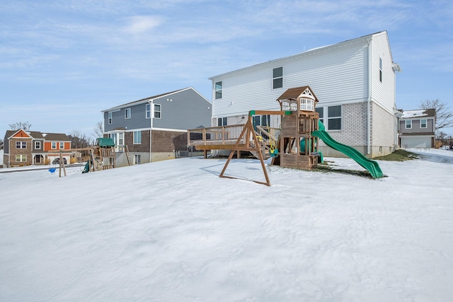 view of snow covered playground