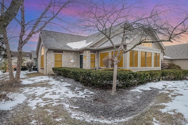 view of snow covered property