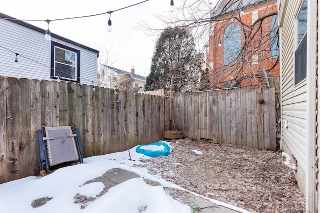 view of snowy yard