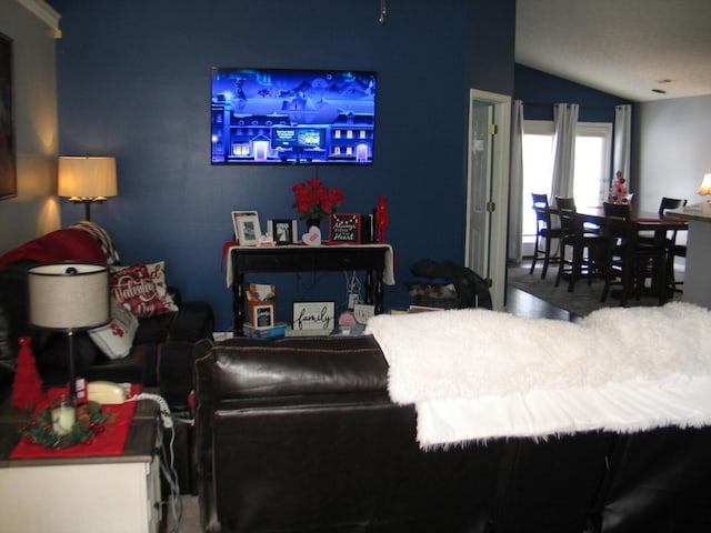 living room with lofted ceiling