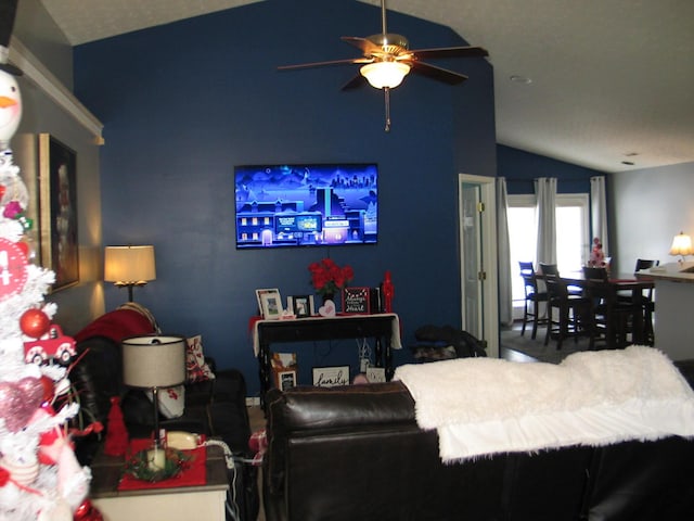 living room with vaulted ceiling and ceiling fan