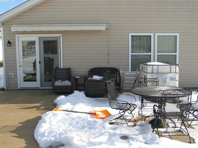 view of snow covered patio