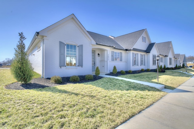 view of front of house with a front lawn