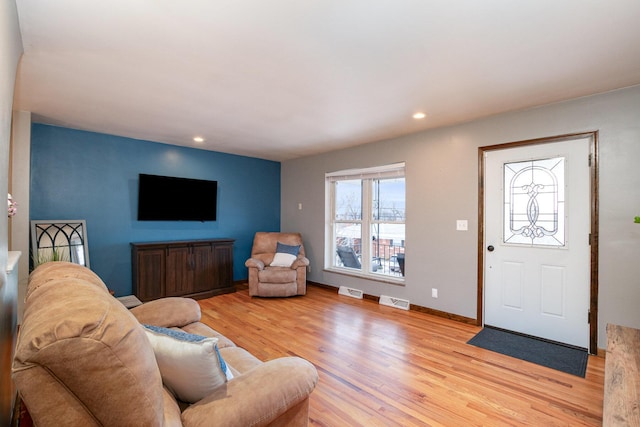 living room featuring light hardwood / wood-style floors