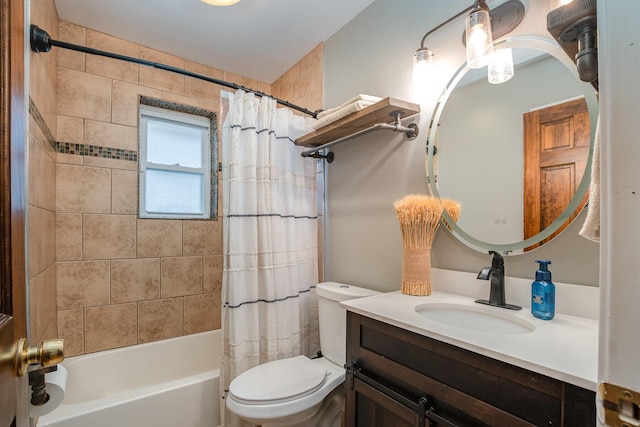 full bathroom with shower / tub combo with curtain, vanity, and toilet