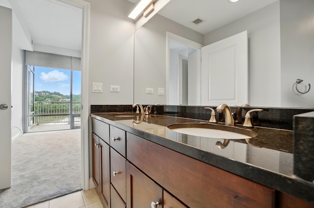 400 Riverboat Row Unit 605, Newport, KY 41071 - bathroom featuring double vanity and tile patterned floors