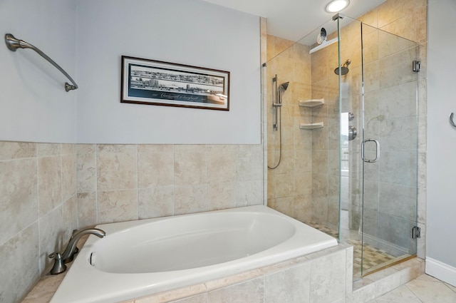 400 Riverboat Row Unit 605, Newport, KY 41071 - bathroom with a bath and a shower stall