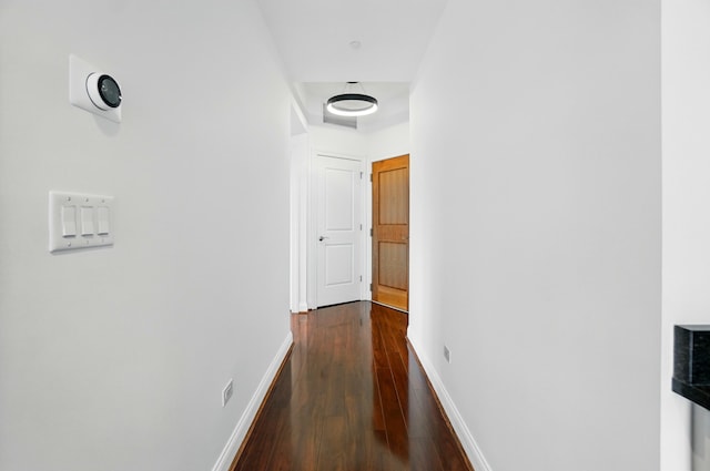400 Riverboat Row Unit 605, Newport, KY 41071 - hallway featuring dark wood-style floors and baseboards