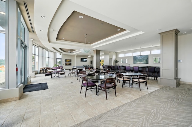 400 Riverboat Row Unit 605, Newport, KY 41071 - dining room with a raised ceiling, baseboards, and recessed lighting
