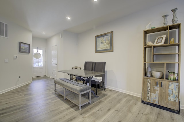 dining room with light hardwood / wood-style floors