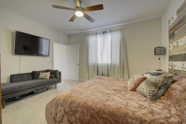 bedroom with ceiling fan and carpet