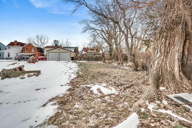 view of yard covered in snow