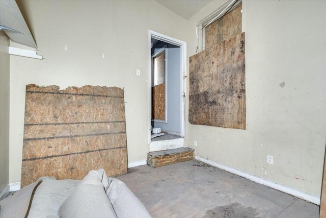 interior space featuring concrete flooring