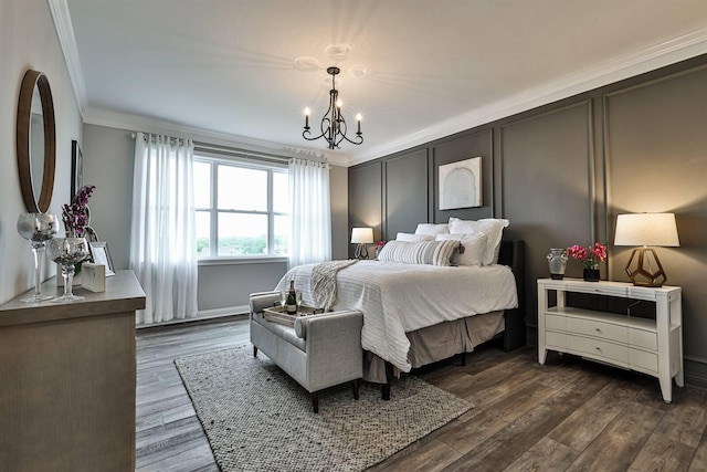 bedroom with a notable chandelier, crown molding, and dark hardwood / wood-style flooring