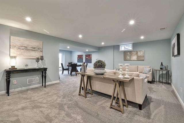 dining room with light colored carpet