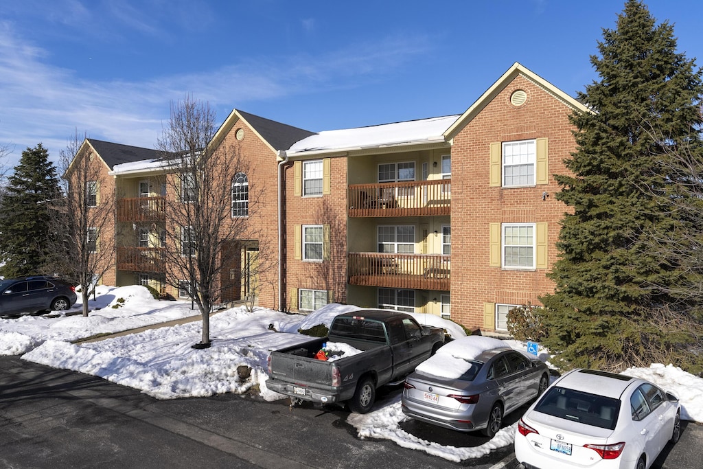 view of snow covered property