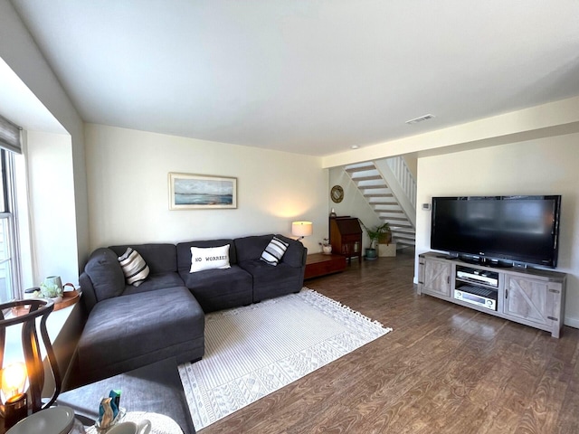 living room featuring dark hardwood / wood-style flooring