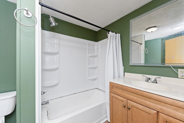 full bathroom with toilet, a textured ceiling, shower / bath combo, and vanity