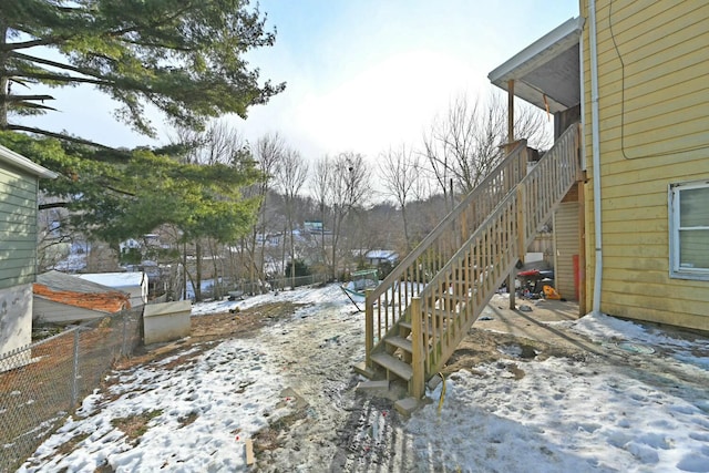 view of yard covered in snow