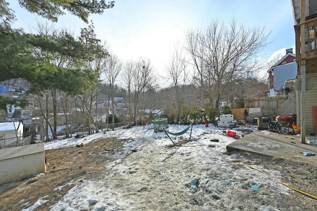 view of yard covered in snow