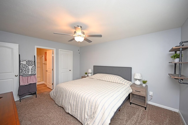 bedroom with ceiling fan and carpet