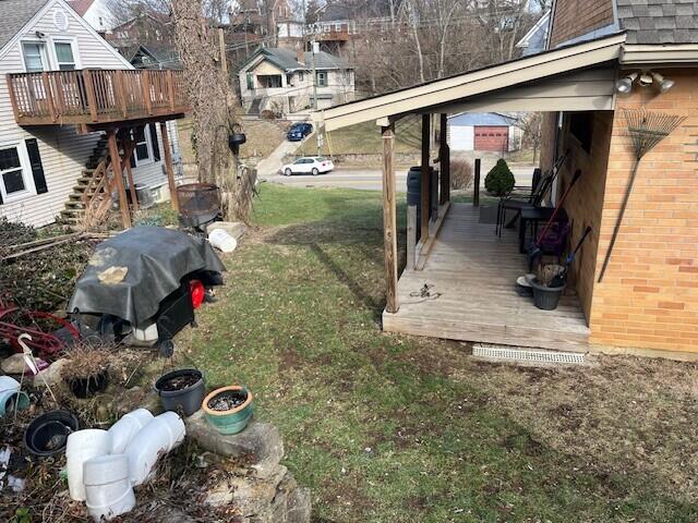 view of yard with a wooden deck