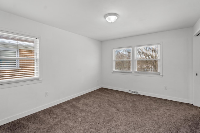 empty room featuring carpet