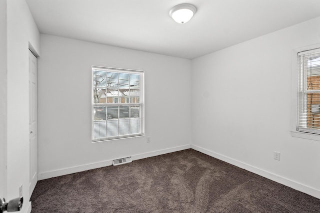 view of carpeted spare room