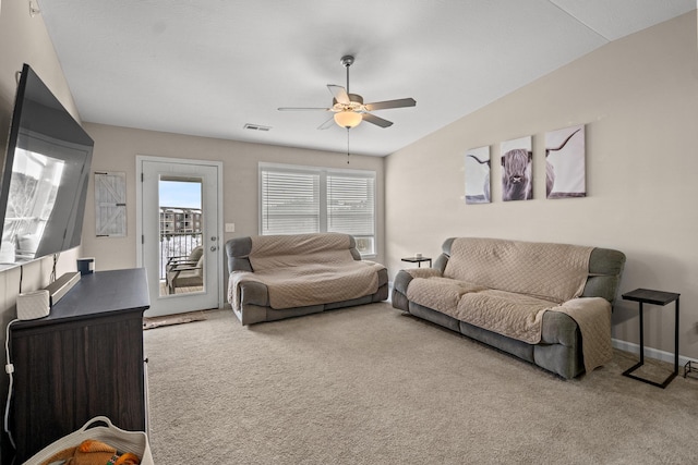 living room featuring light colored carpet and ceiling fan