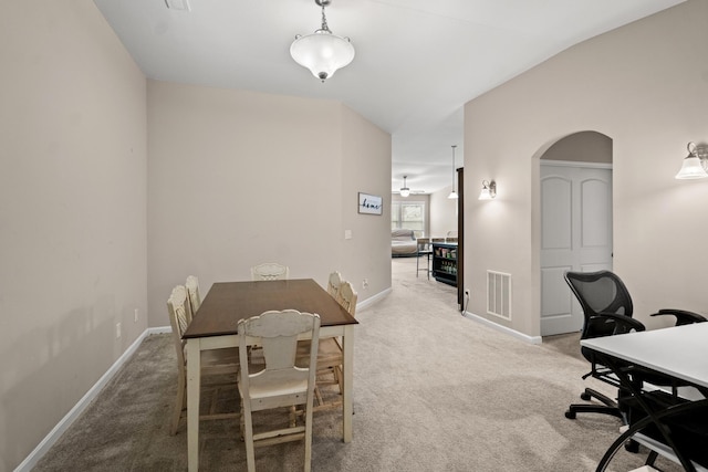 office featuring lofted ceiling and carpet floors