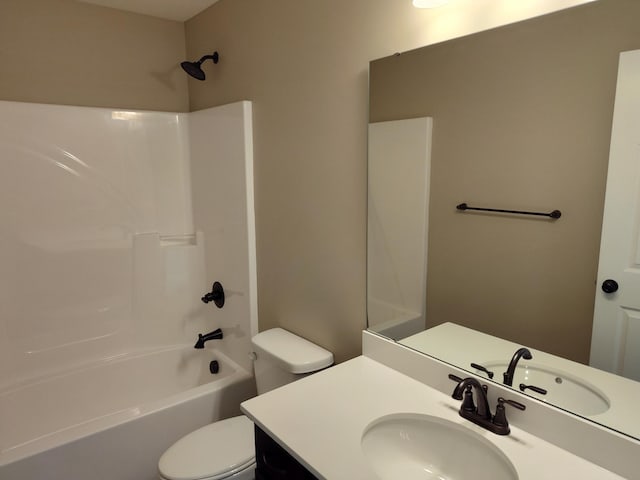 full bathroom featuring shower / washtub combination, toilet, and vanity