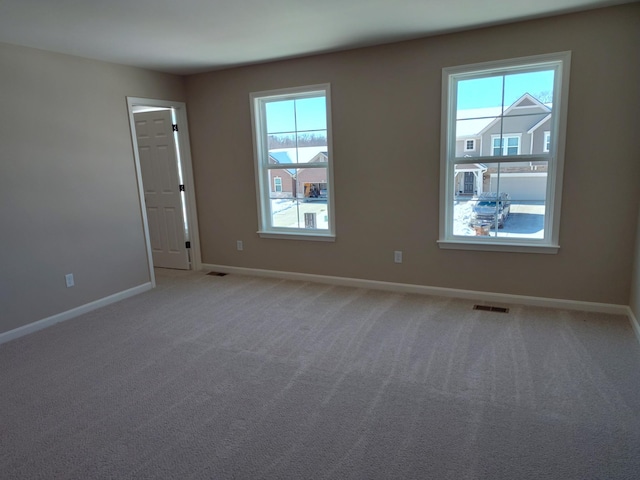 view of carpeted spare room