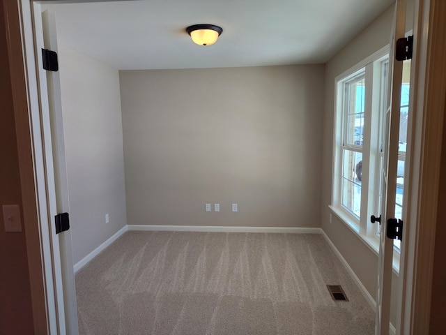 view of carpeted spare room